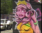 Graffity-Frau im Vordergrund - Hintergrund Auto mit Mensch Bild: Graffity-Frau im Vordergrund - Hintergrund Auto mit Mensch